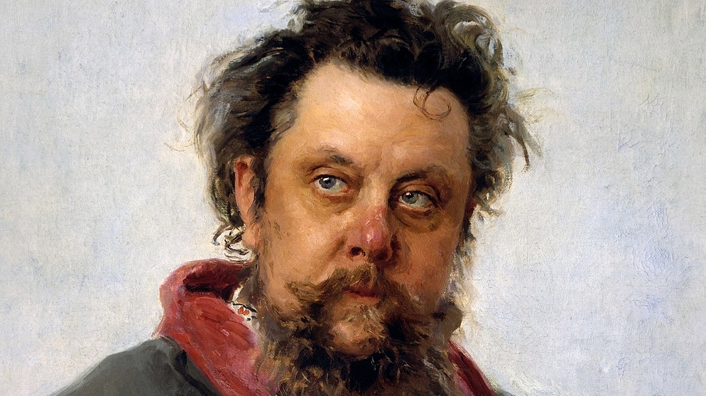 KI generiert: Dieses Bild zeigt ein Porträt eines Mannes mit zerzaustem Haar und einem dichten Bart, der nachdenklich in die Ferne blickt. Der Hintergrund ist dezent und lenkt den Fokus auf das ausdrucksstarke Gesicht des Mannes.